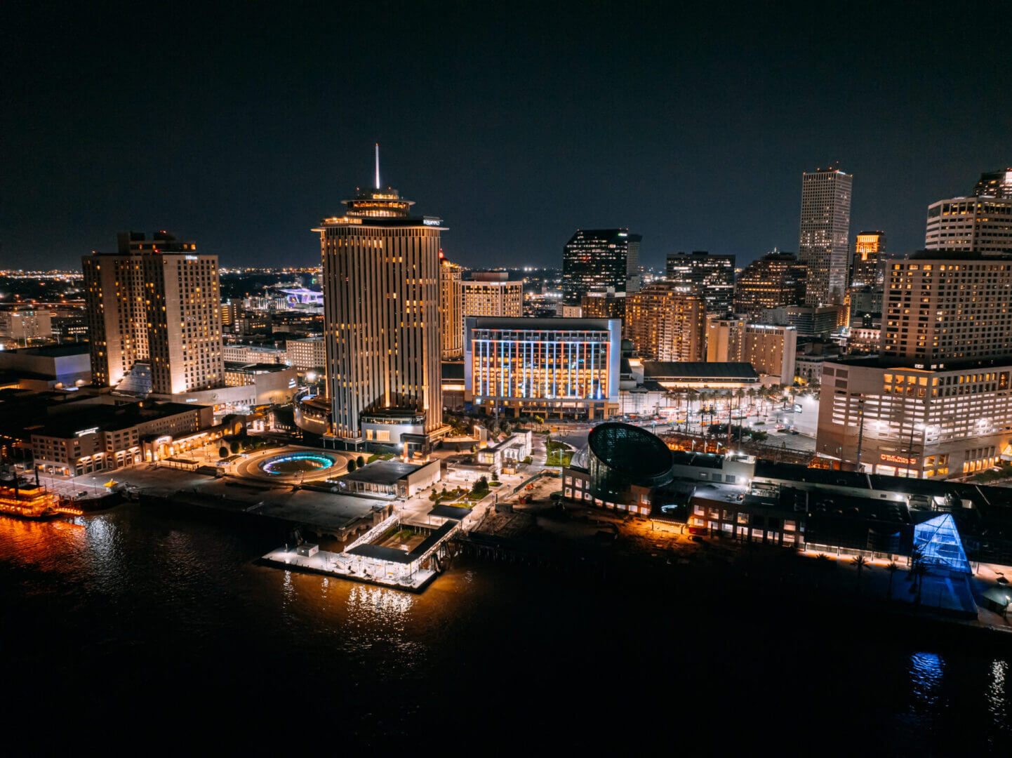 City skyline at night with illuminated buildings