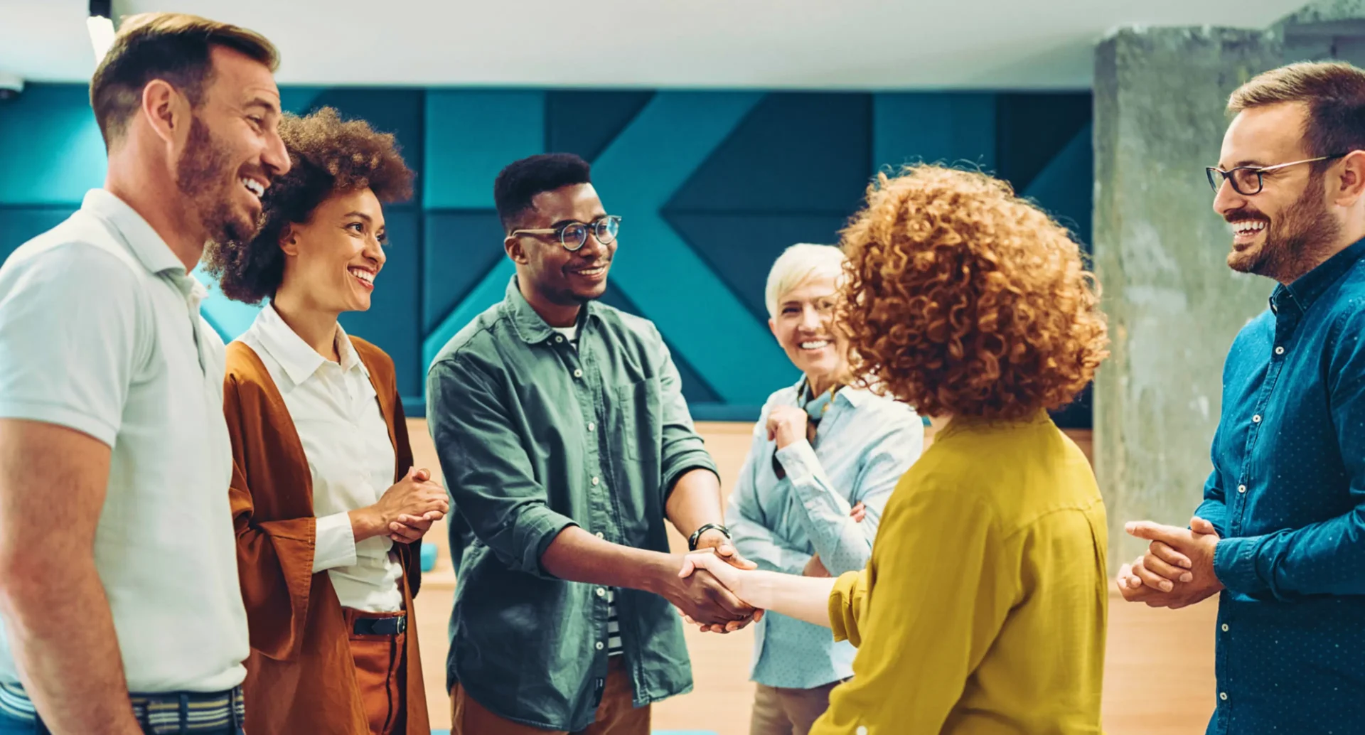Colleagues smiling during a business gathering